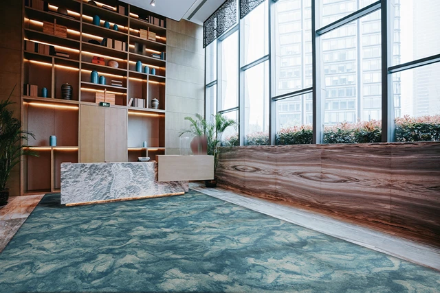An example of Natura Arcus Electric from Ulster Carpets in a modern room setting 