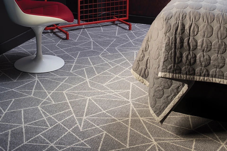 An example of Vescent Linea Zinc from Ulster Carpets in a hospitality setting
