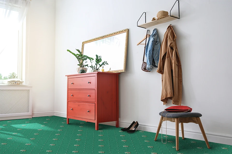 An example of Athenia Pale Green Motif from Ulster Carpets in a modern room setting 