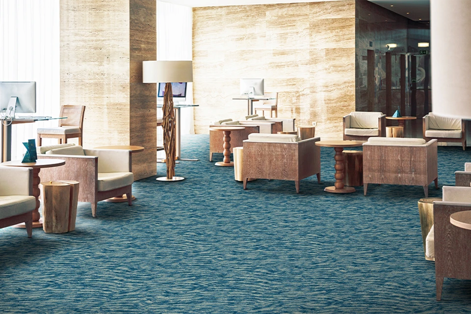 An example of Natura Esker Azul from Ulster Carpets in a modern room setting 